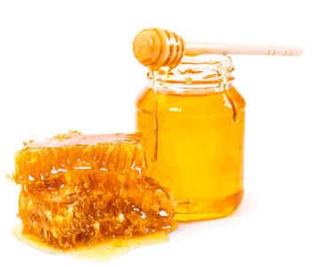 frasco de mel com favos de mel
